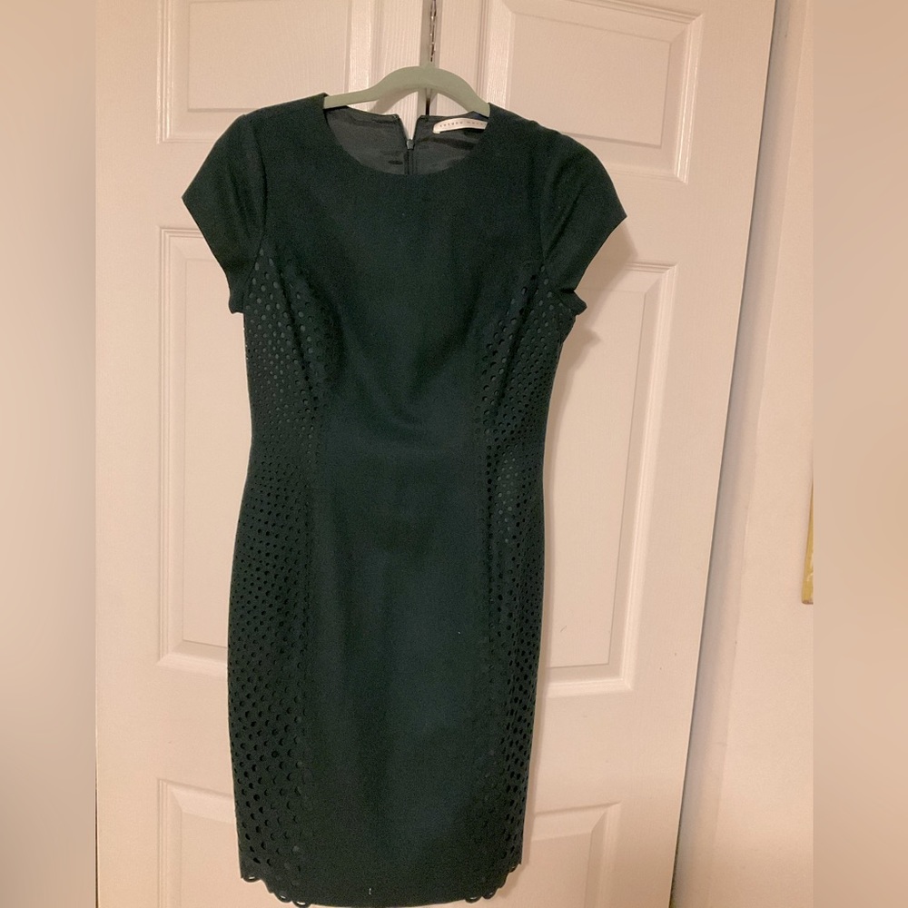 Forest green lightwool dress with preforated panels